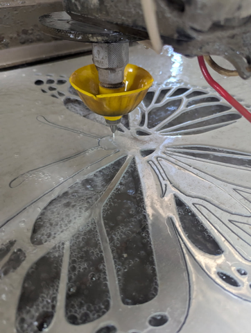 water jet cutting of steel butterfly